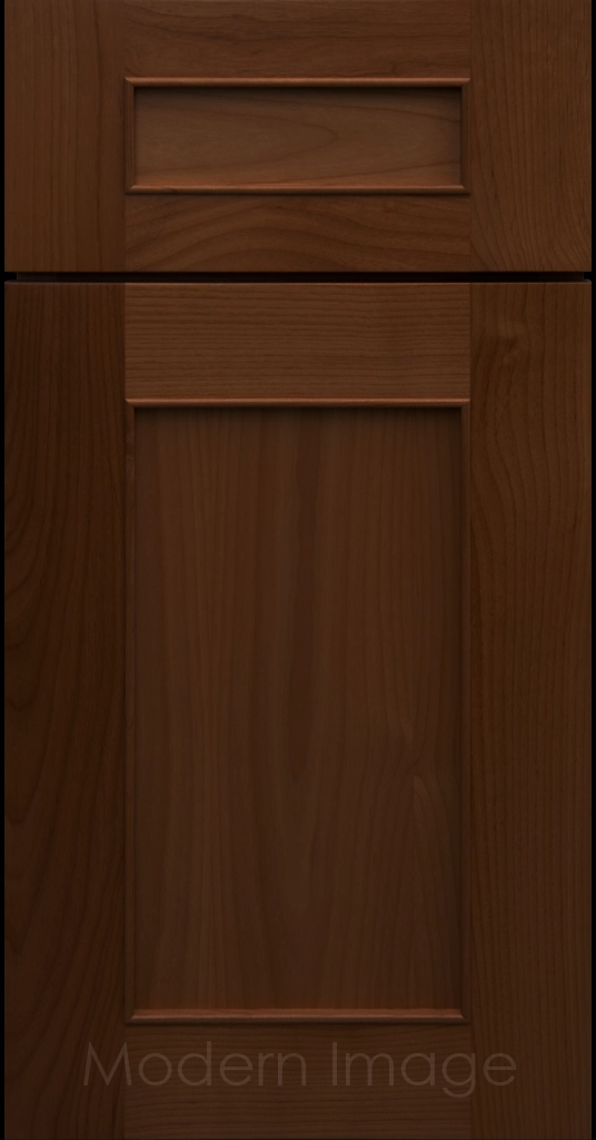 Detail view of a Chandler Shaker cabinet door in Pecan stain with raised molding along the inner panel.